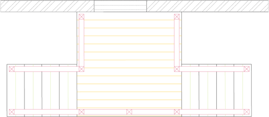 Overhead view of a small deck attached to the side of a house.