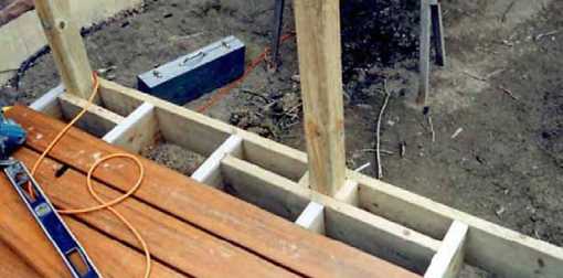 Sub-structure of new deck showing how 4x4 rail posts are installed.