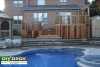 Large 2-level deck with a privacy screen and a pergola.