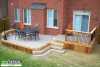 2-level deck with a bench.