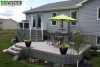 Large 2-level deck at the back of a house.